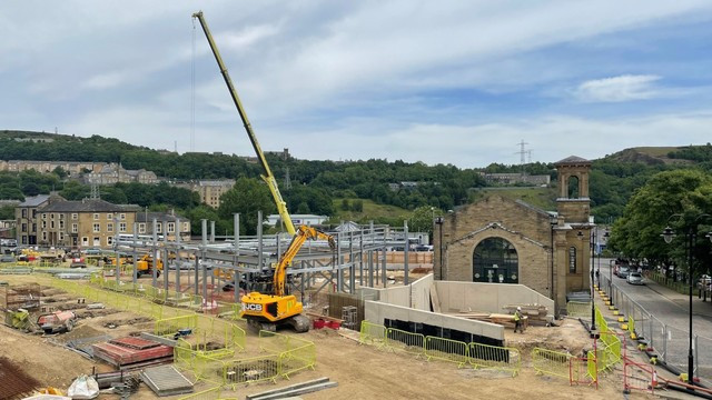 First glimpse of frame that will support modern glazed structure alongside the existing Listed Sion Chapel.